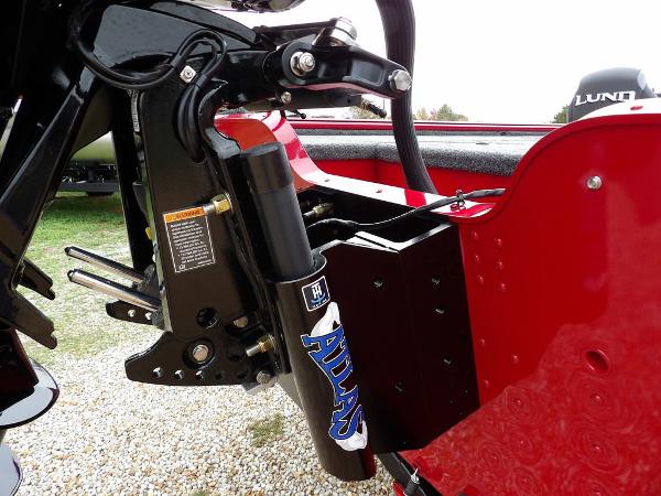 Slide: The Image of Close-up of 2024 Lund 2075 Pro-V Bass XS boat's hydraulic system. - 47