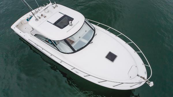 Slide: The Image of 2023 Mag Bay 42 Express boat on water, aerial view. - 28