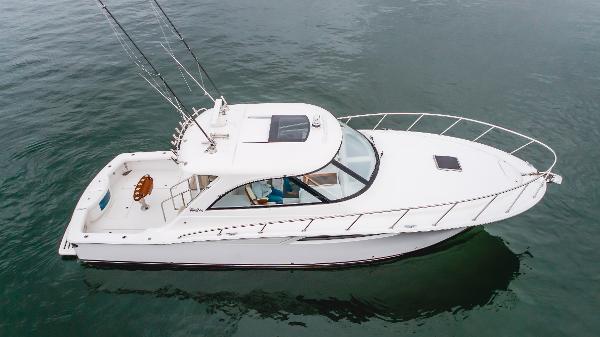 Slide: The Image of 2023 Mag Bay 42 Express yacht on calm water, aerial view. - 29