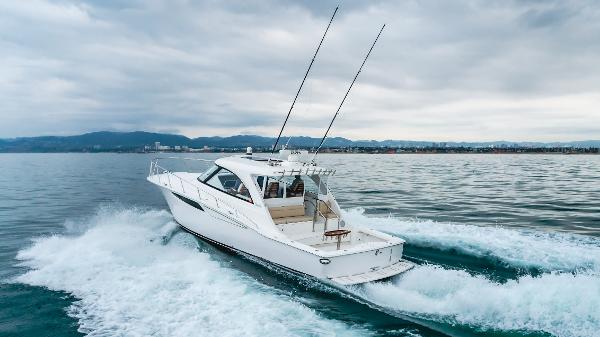 Slide: The Image of 2023 Mag Bay 42 Express yacht cruising on open water. - 3