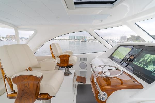Slide: The Image of Luxurious interior of 2023 Mag Bay 42 Express yacht with modern helm and seating. - 32