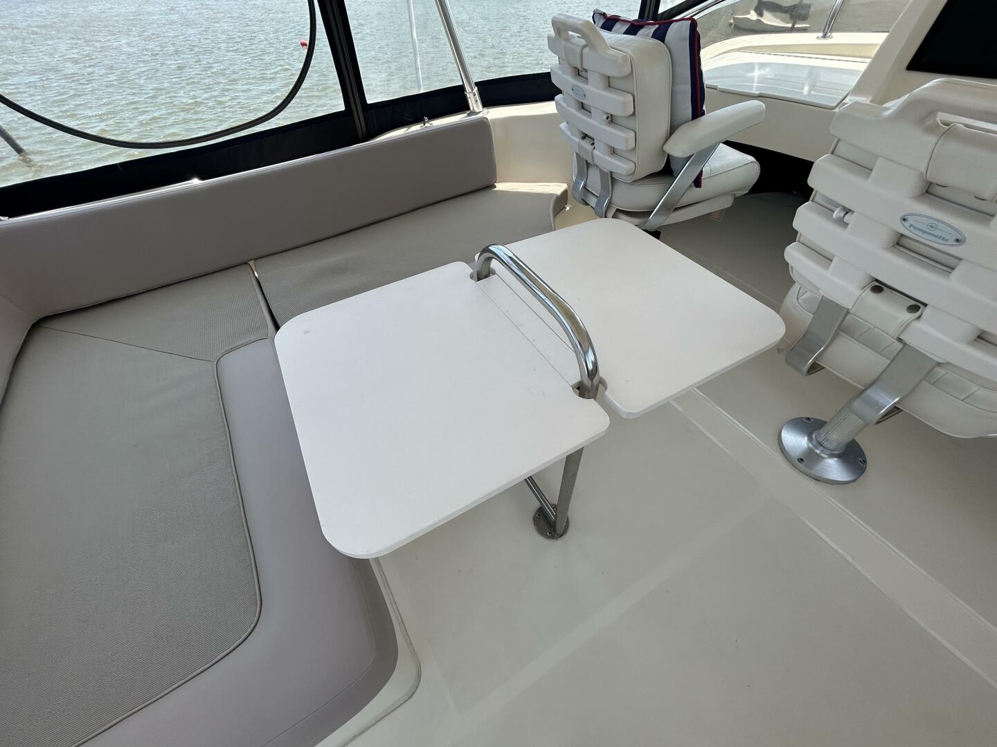 Slide: The Image of 34' Mainship flybridge table - 5297649