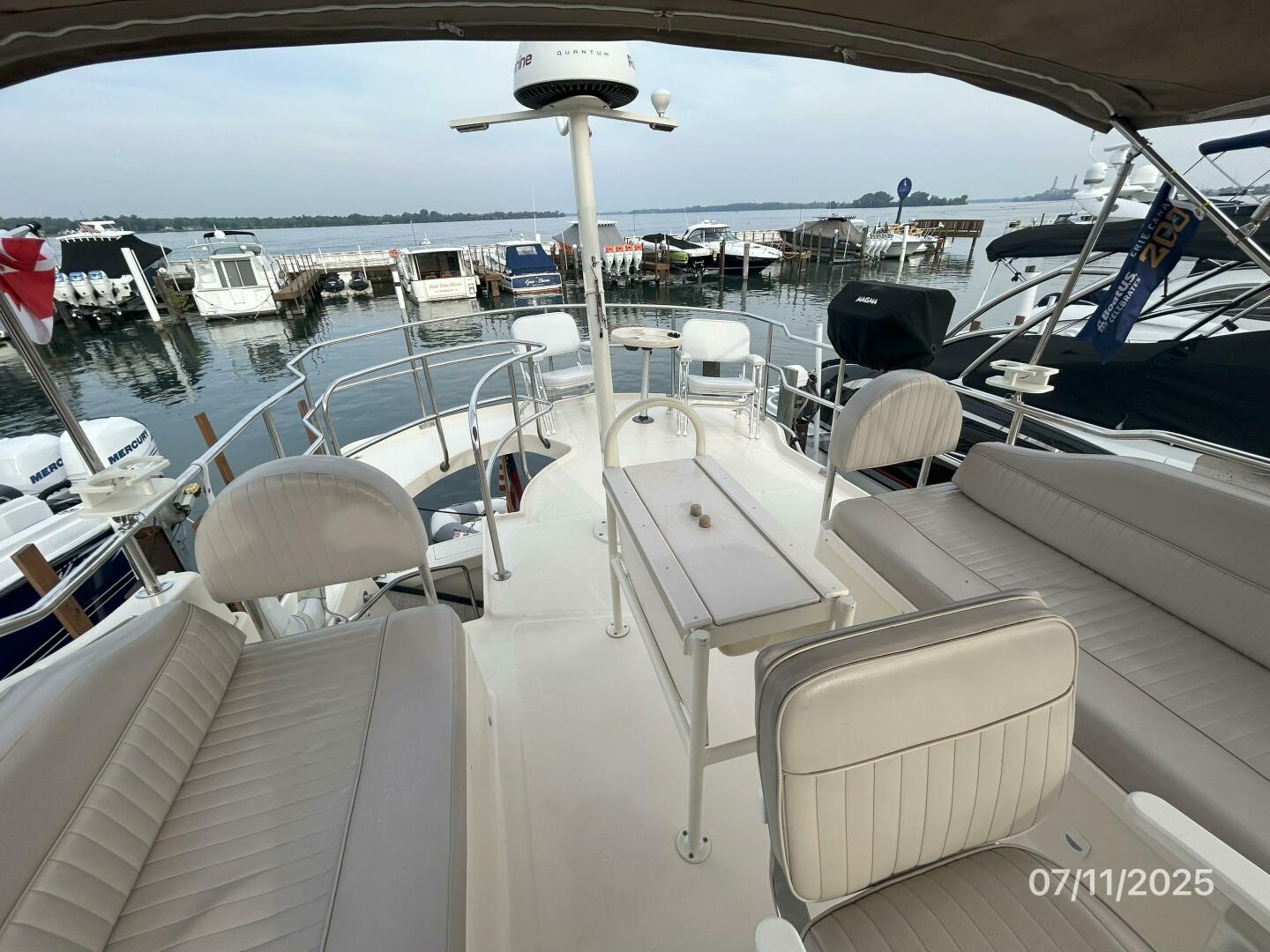 Slide: The Image of 39' Mainship flybridge aft - 5472683