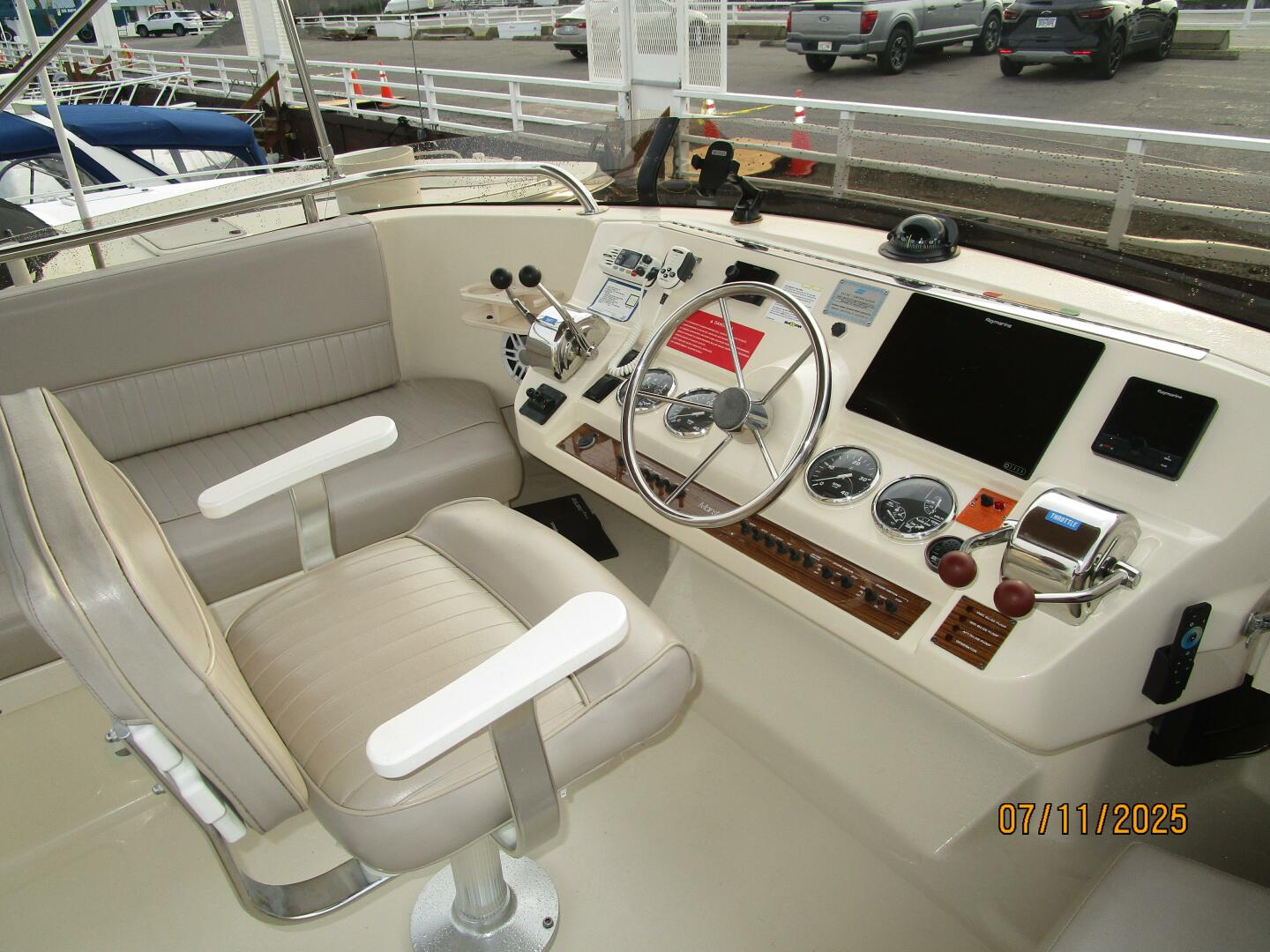Slide: The Image of 39' Mainship flybridge helm1 - 5472685