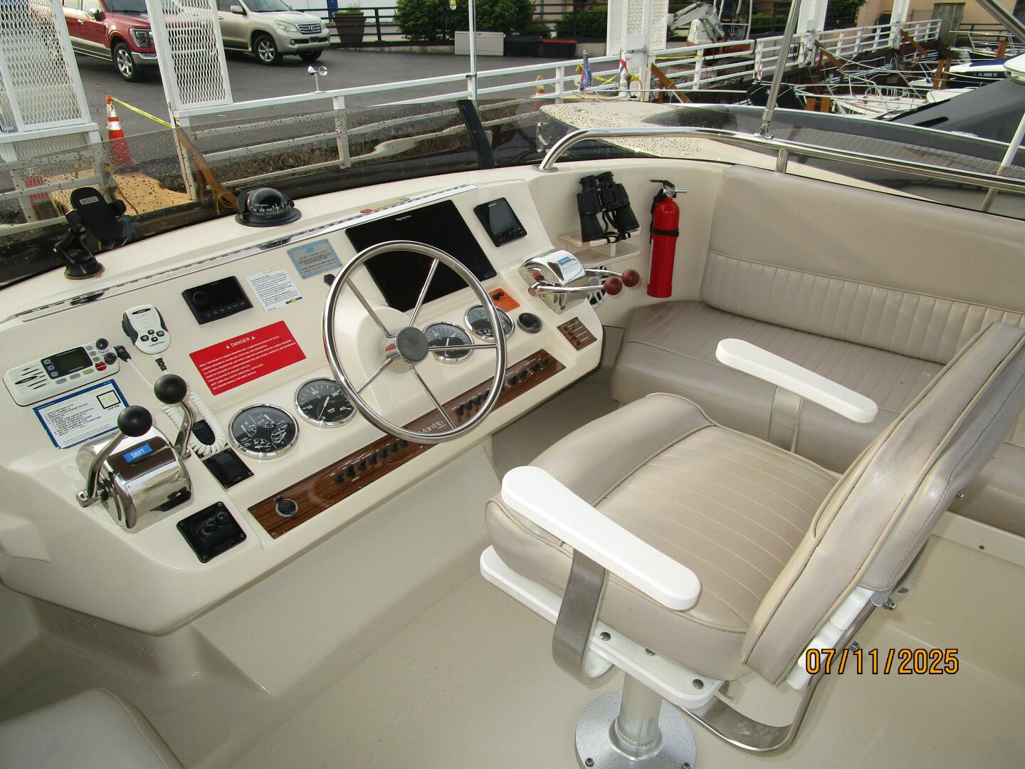 Slide: The Image of 39' Mainship flybridge helm2 - 5472687