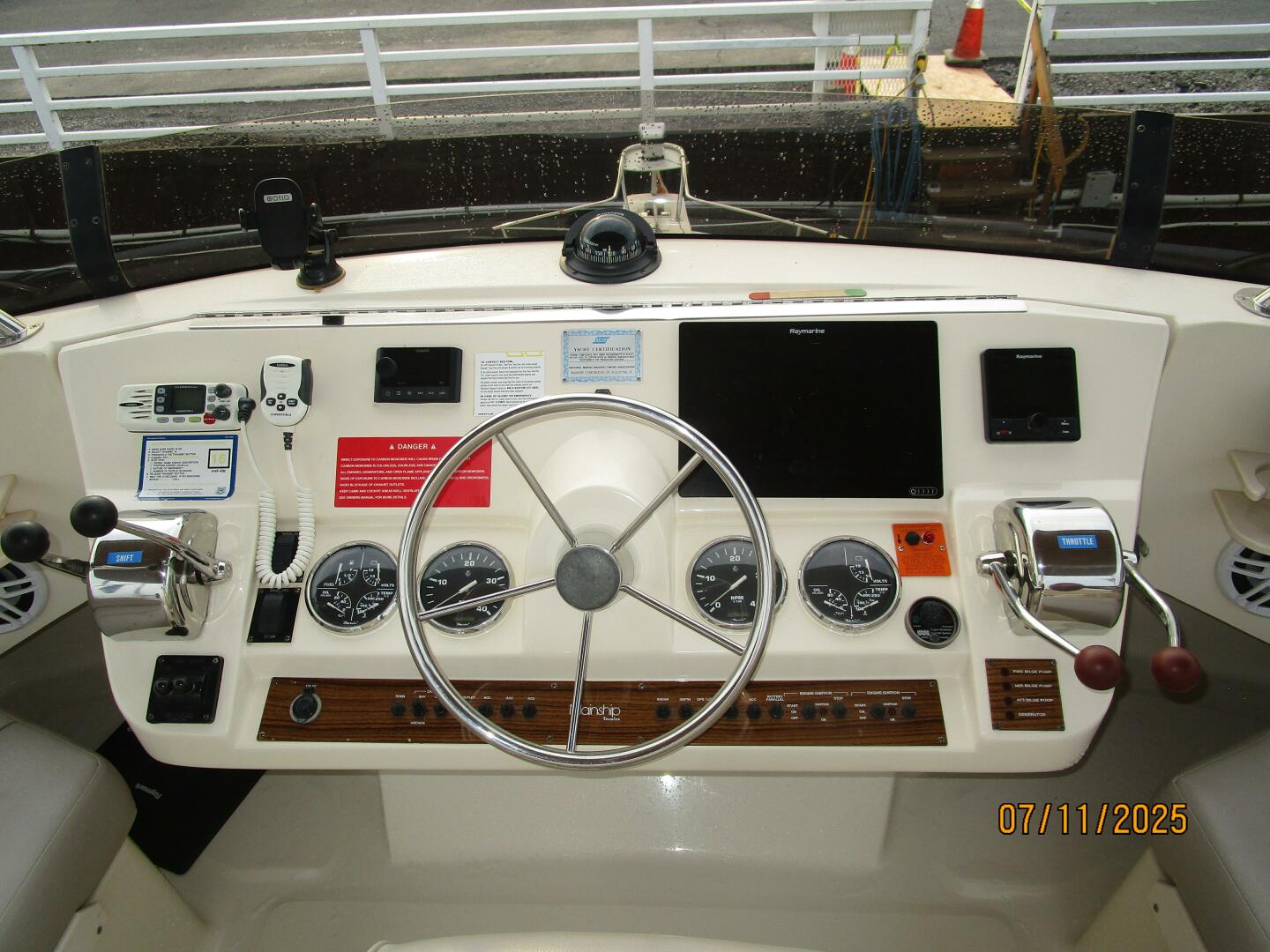Slide: The Image of 39' Mainship flybridge helm3 - 5472686