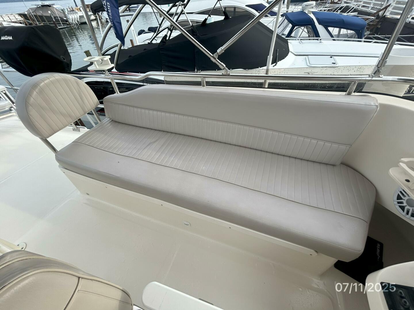 Slide: The Image of 39' Mainship flybridge port seating - 5472690