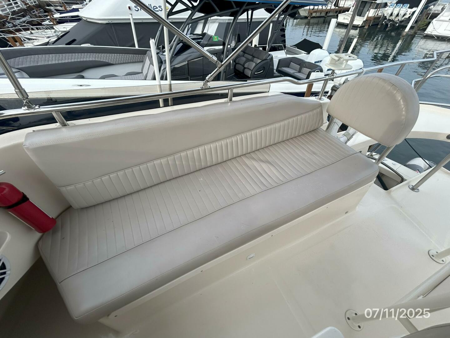 Slide: The Image of 39' Mainship flybridge starboard seating - 5472692