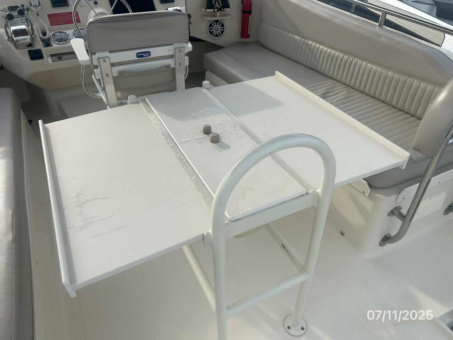 Slide: The Image of 39' Mainship flybridge table - 5472693