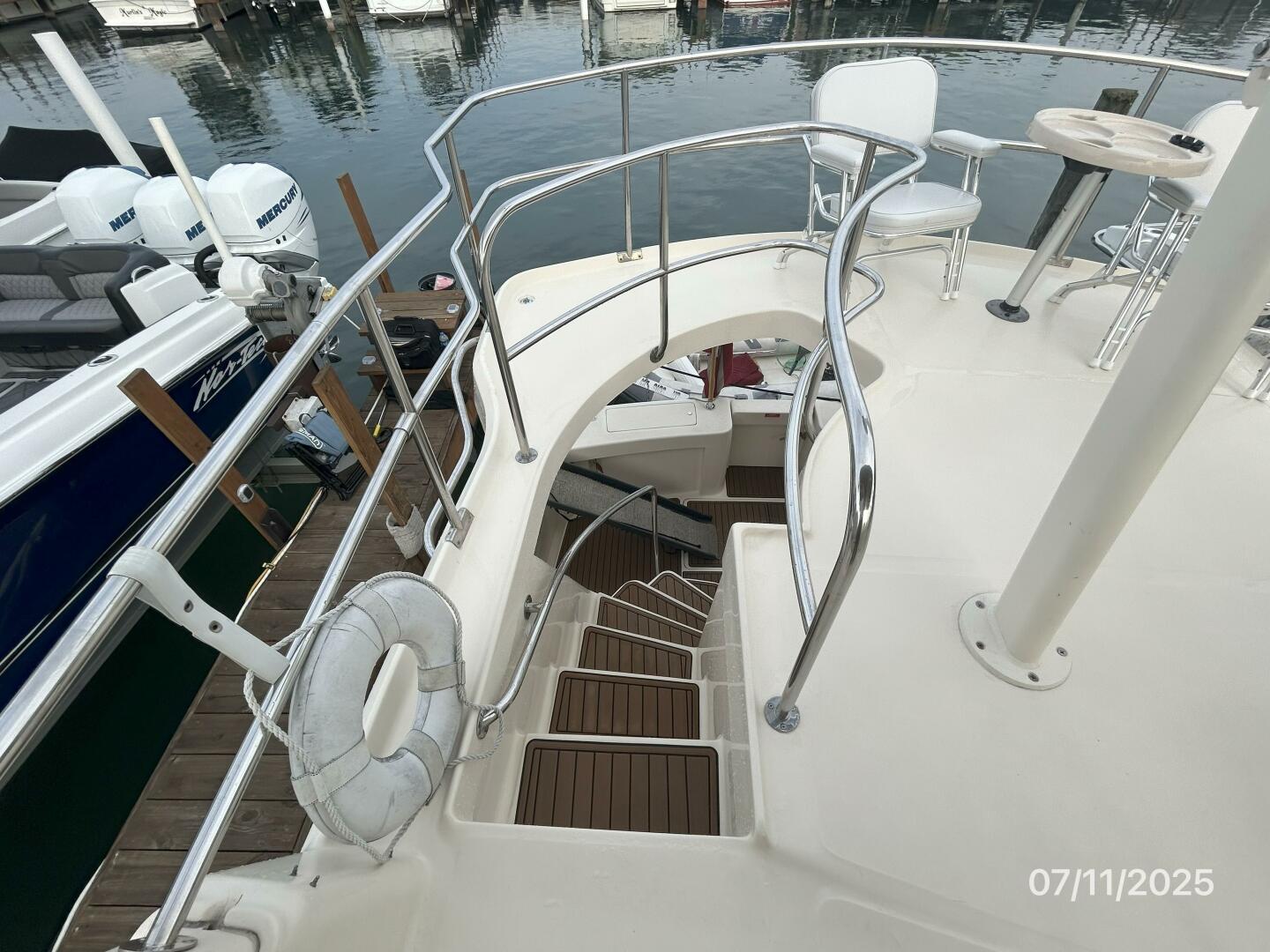Slide: The Image of 39' Mainship flybridge-aftdeck stairs - 5472694