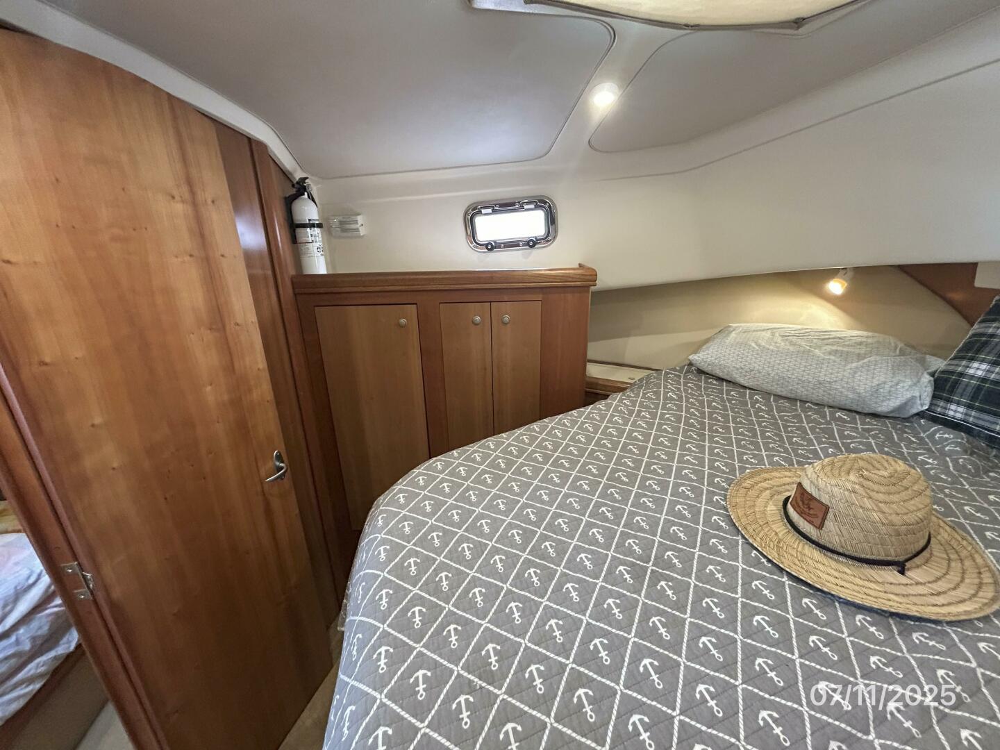 Slide: The Image of 39' Mainship master stateroom port - 5472713