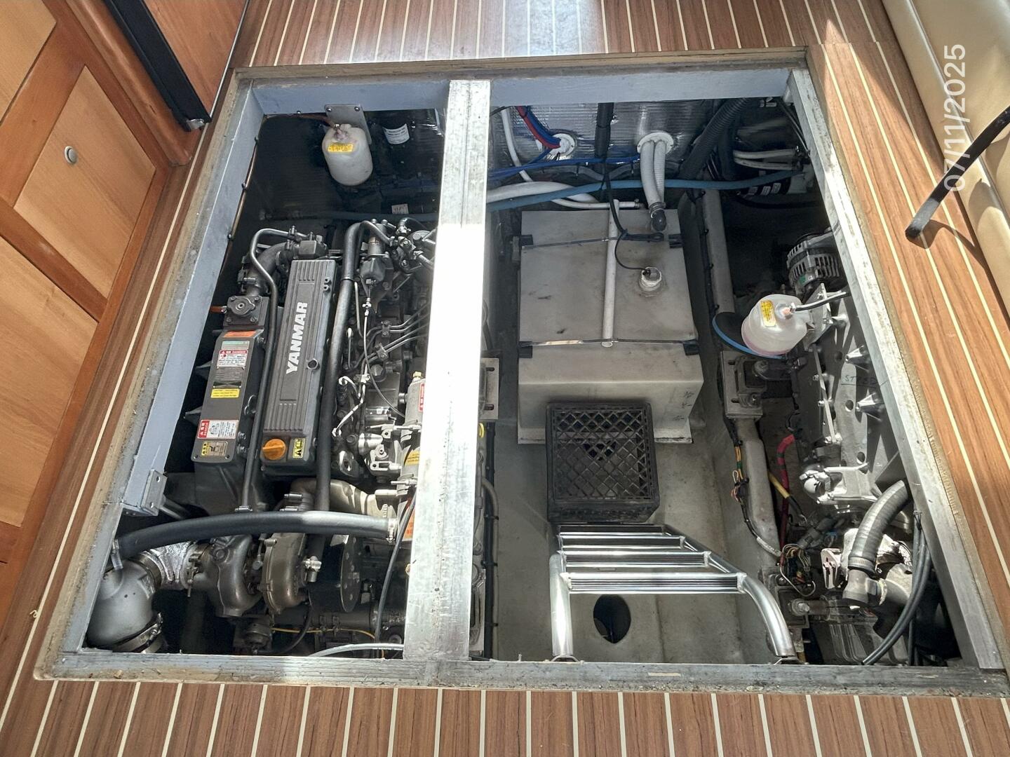 Slide: The Image of 39' Mainship engine room access - 5472682