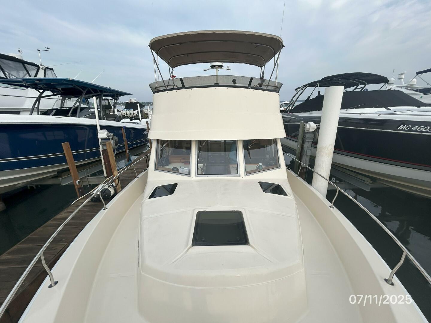 Slide: The Image of 39' Mainship foredeck aft - 5472695