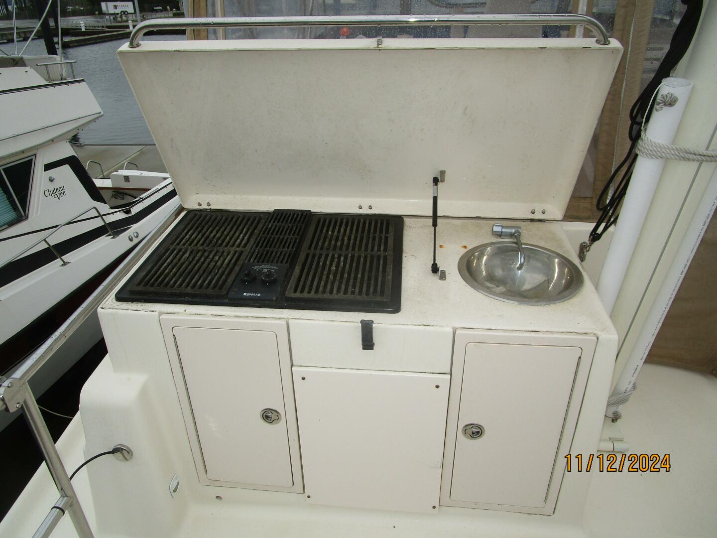 Slide: The Image of 40' Mainship summer kitchen2 - 4802580