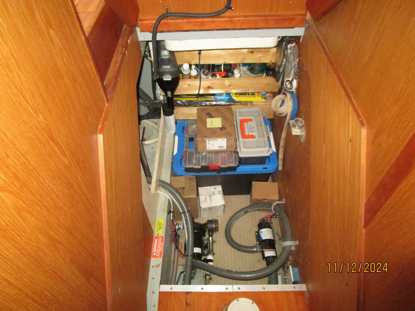 Slide: The Image of 40' Mainship companionway storage - 4801479