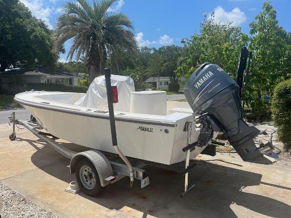 Slide: The Image of 1988 Mako 171 Center Console boat on trailer with Yamaha outboard motor. - 1