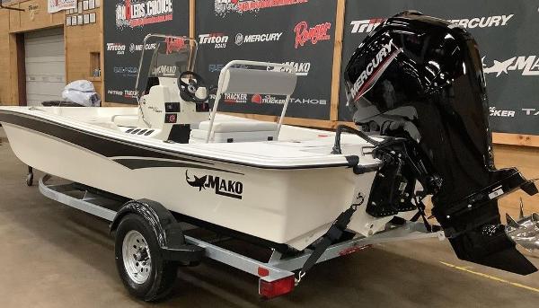 Slide: The Image of 2023 Mako Pro Skiff 17 CC boat with Mercury engine on trailer. - 8