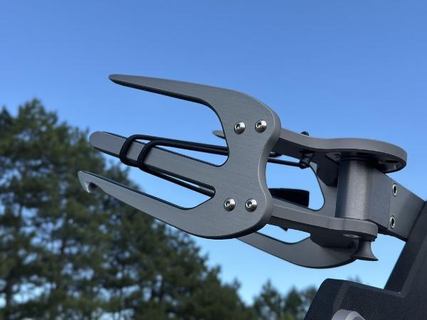 Slide: The Image of Wakeboard rack on 2025 Malibu 23 LSV against a clear blue sky. - 4