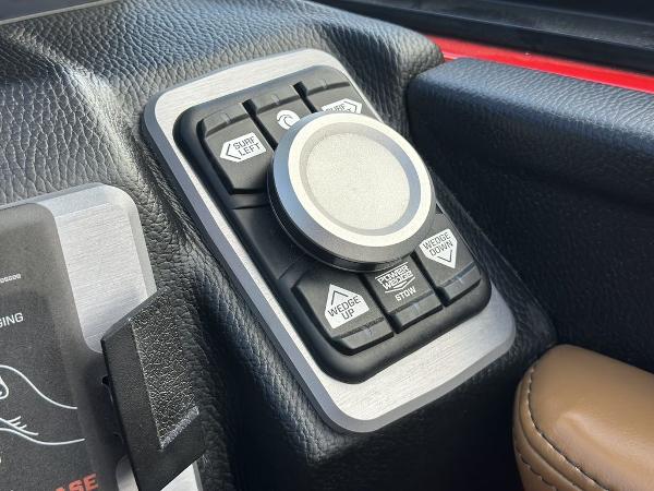Slide: The Image of Control panel of 2025 Malibu 23 LSV boat with various adjustment buttons. - 5