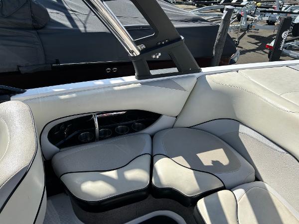 Slide: The Image of 2013 Malibu Wakesetter 20 VTX interior with beige seating and sleek design. - 12