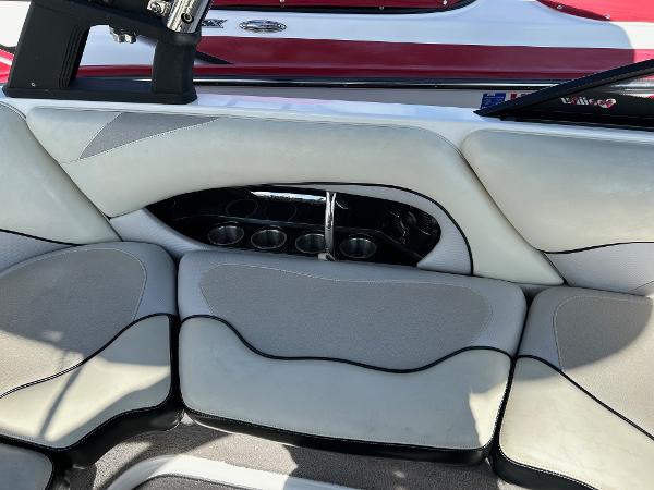 Slide: The Image of Interior seating of 2013 Malibu Wakesetter 20 VTX boat with cup holders. - 13