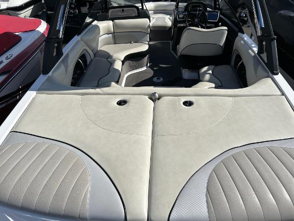 Slide: The Image of 2013 Malibu Wakesetter 20 VTX boat interior with beige seating and sleek design. - 15