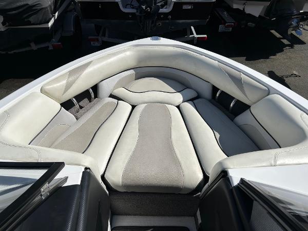 Slide: The Image of 2013 Malibu Wakesetter 20 VTX boat interior with cushioned seating. - 7