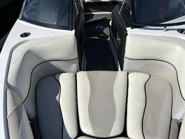 Slide: The Image of Interior of 2013 Malibu Wakesetter 20 VTX boat with cushioned seating. - 8