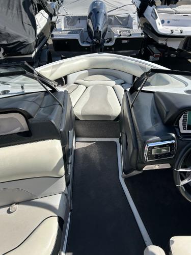 Slide: The Image of 2013 Malibu Wakesetter 20 VTX interior with sleek seating and modern dashboard. - 9