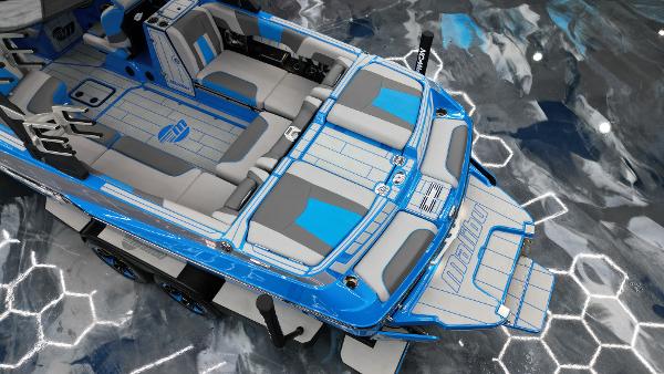 Slide: The Image of 2021 Malibu Wakesetter 24 MXZ boat, blue and gray interior, top view. - 13