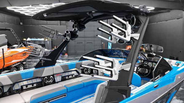 Slide: The Image of 2021 Malibu Wakesetter 24 MXZ boat with sleek interior and advanced audio system. - 7