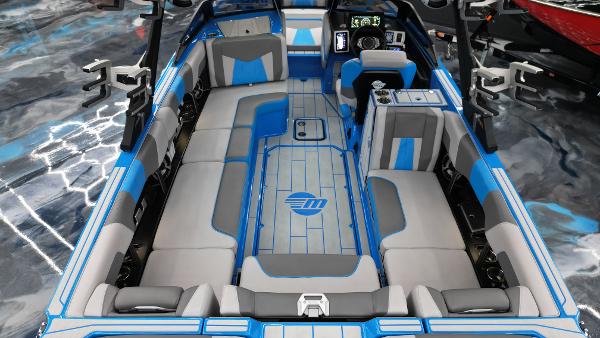 Slide: The Image of 2021 Malibu Wakesetter 24 MXZ interior, featuring spacious seating and modern design. - 9