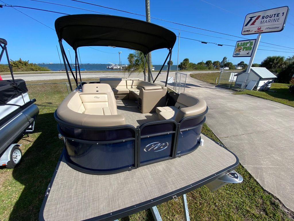 Slide: The Image of 2022 Manitou 18 Aurora LE Standard Twin Tube pontoon boat at Route 1 Marine. - 19