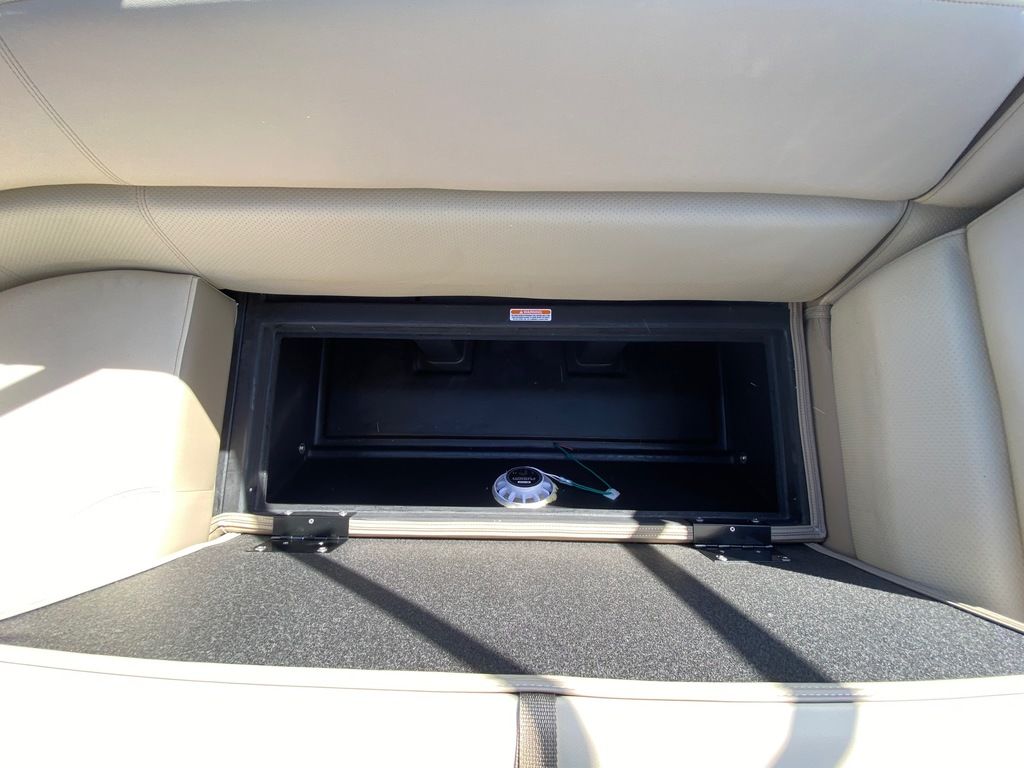 Slide: The Image of 2022 Manitou 18 Aurora LE Standard Twin Tube storage compartment. - 24