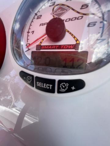 Slide: The Image of Close-up of 2008 Manitou 24 X-Plode Cruise speedometer with Smart Tow feature. - 13