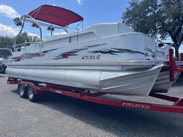 Slide: The Image of 2008 Manitou 24 X-Plode Cruise pontoon boat on red trailer, side view. - 17