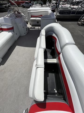 Slide: The Image of 2008 Manitou 24 X-Plode Cruise boat interior with white and red seating. - 9