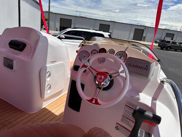 Slide: The Image of Cockpit of 2025 MarinBoat Tango with Garmin navigation, featuring sleek design and modern controls. - 8
