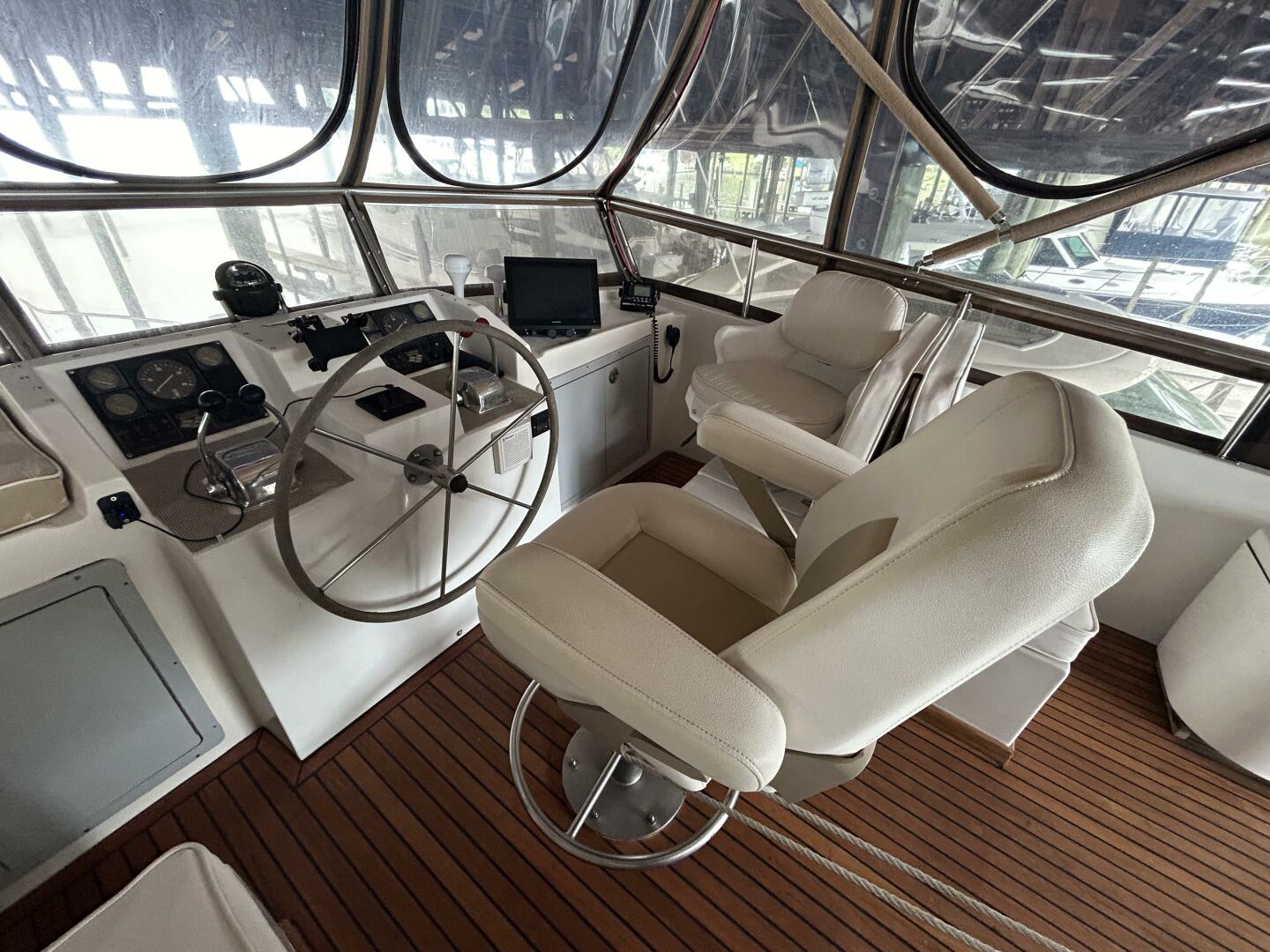 Slide: The Image of 46' Marine Trader flybridge helm1 - 16
