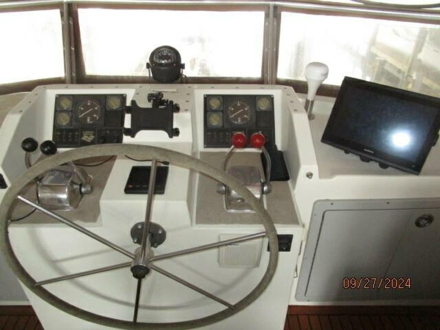 Slide: The Image of 46' Marine Trader flybridge helm2 - 17