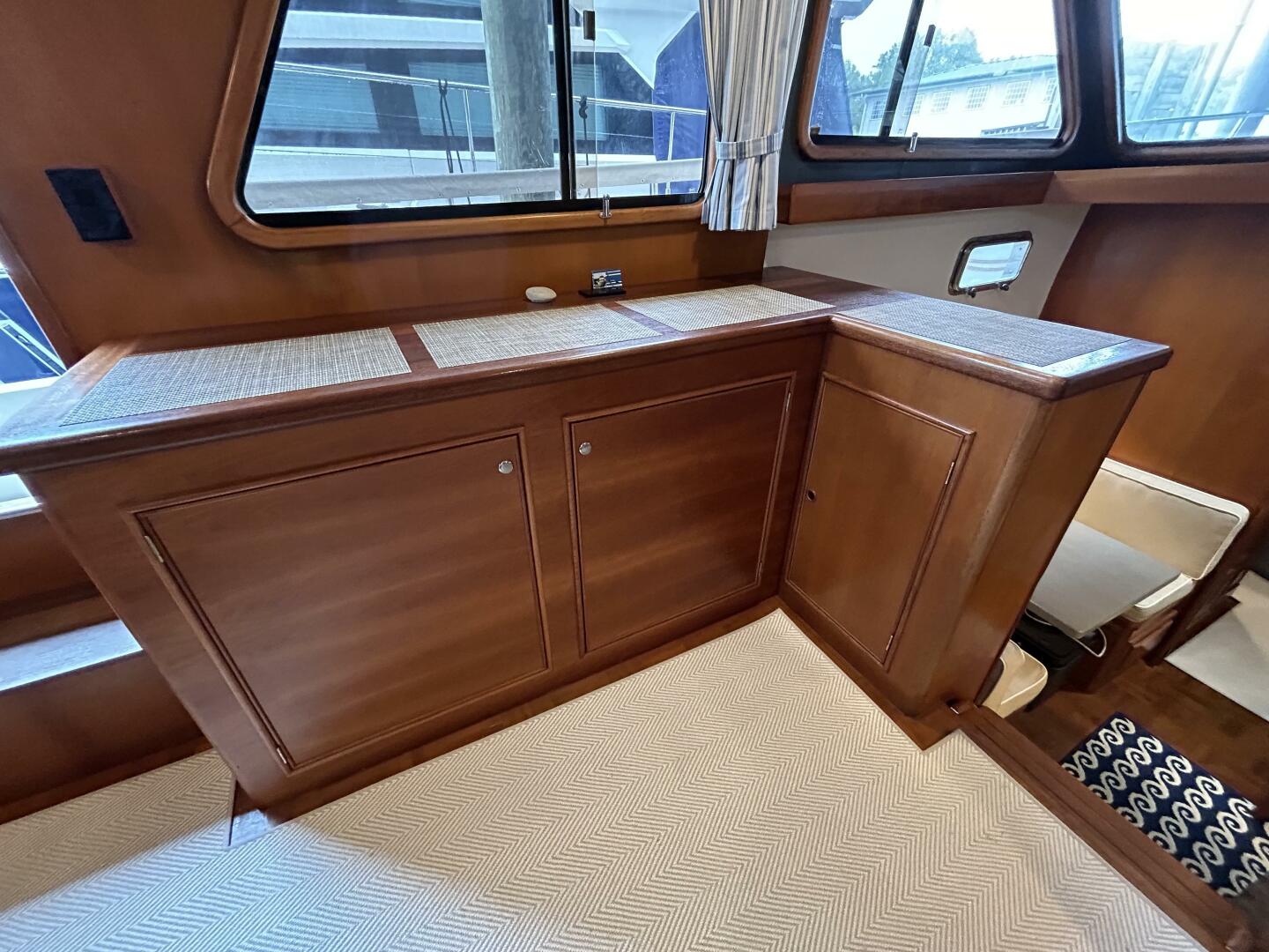 Slide: The Image of 46' Marine Trader salon port cabinetry - 39