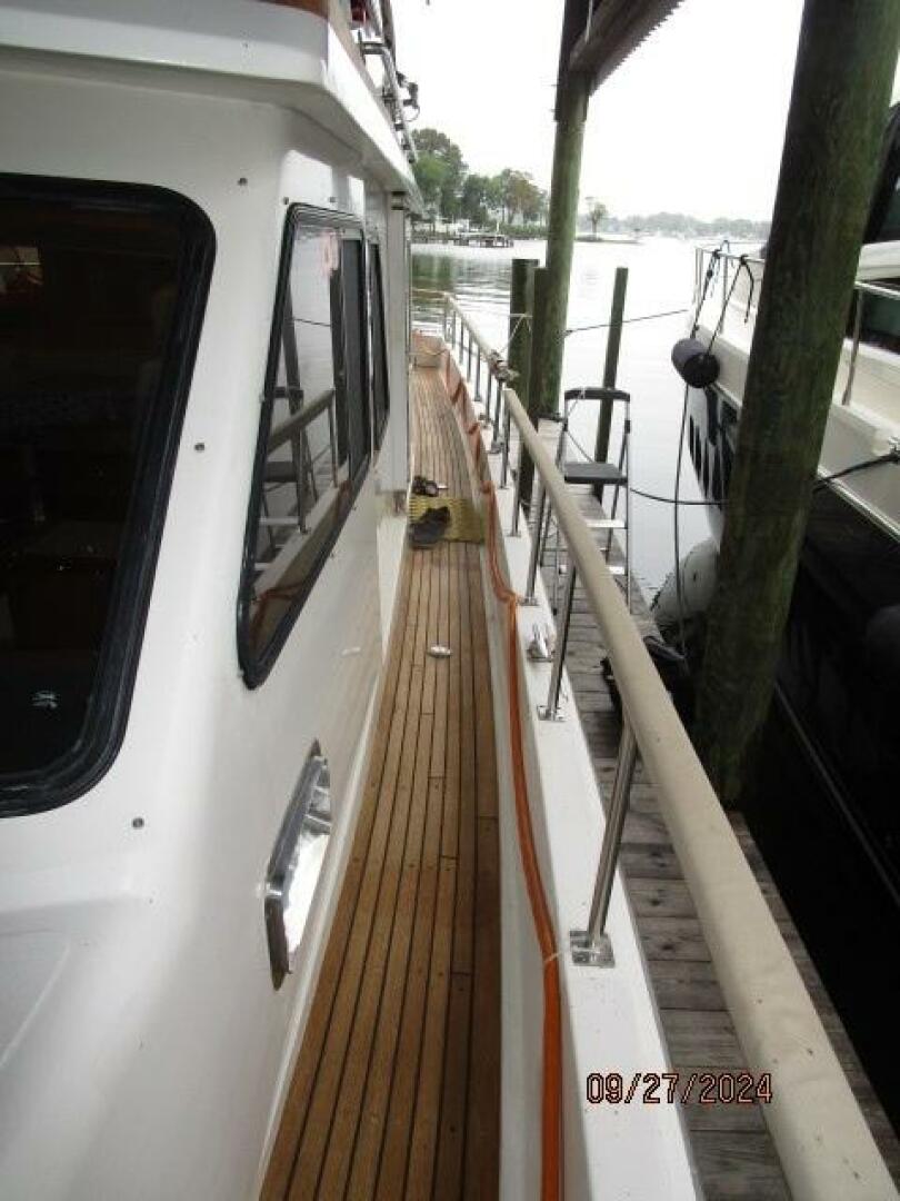 Slide: The Image of 46' Marine Trader port side deck1 - 5