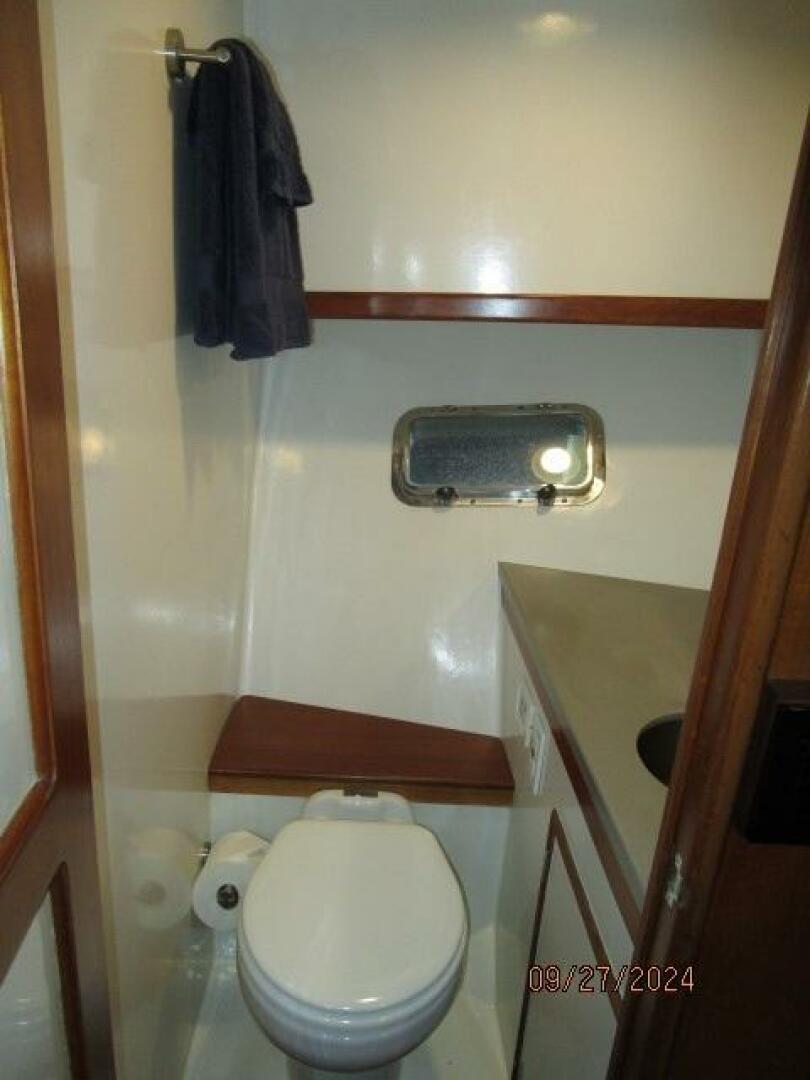 Slide: The Image of 46' Marine Trader guest stateroom head - 56