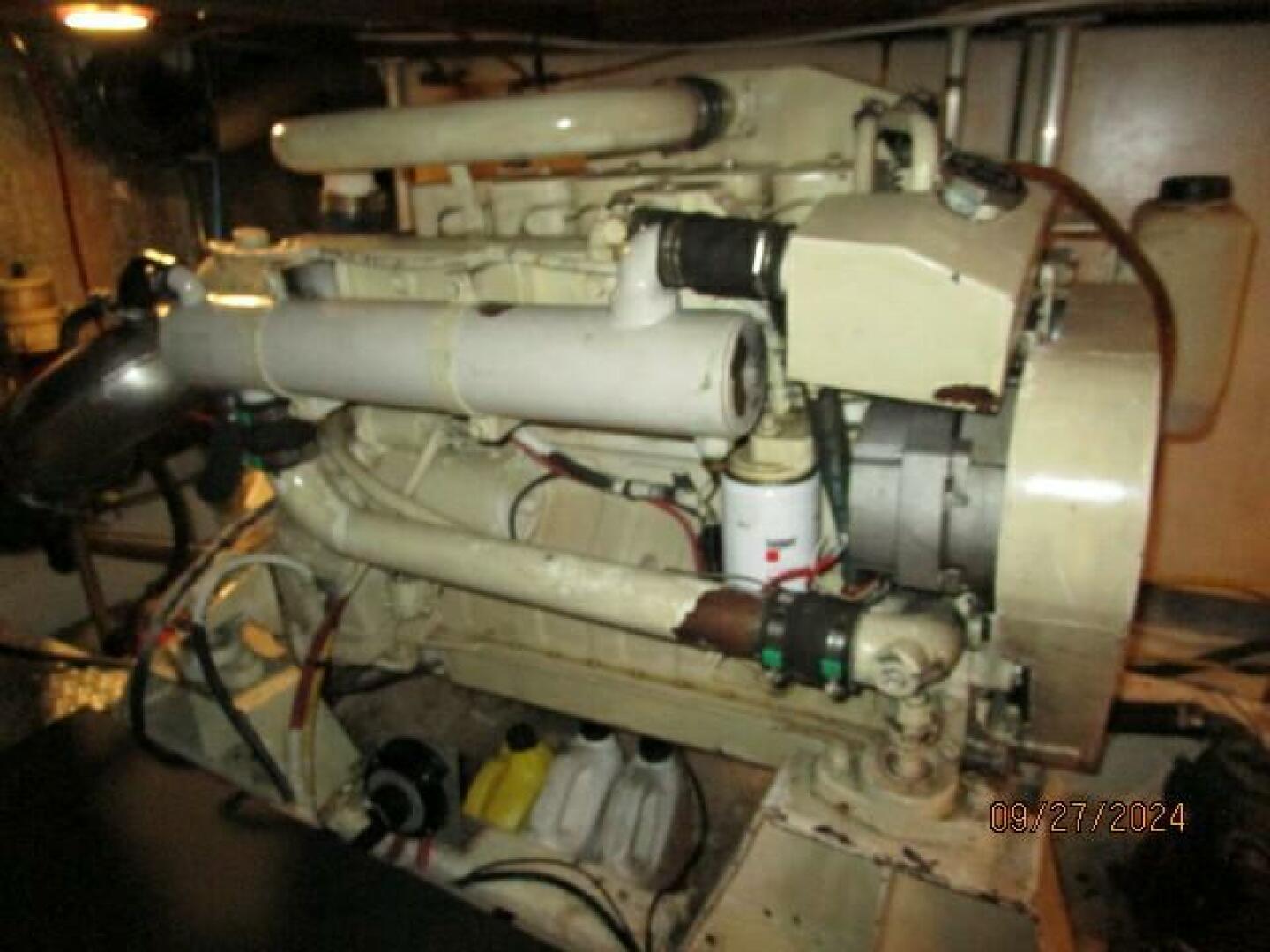 Slide: The Image of 46' Marine Trader port main engine - 61