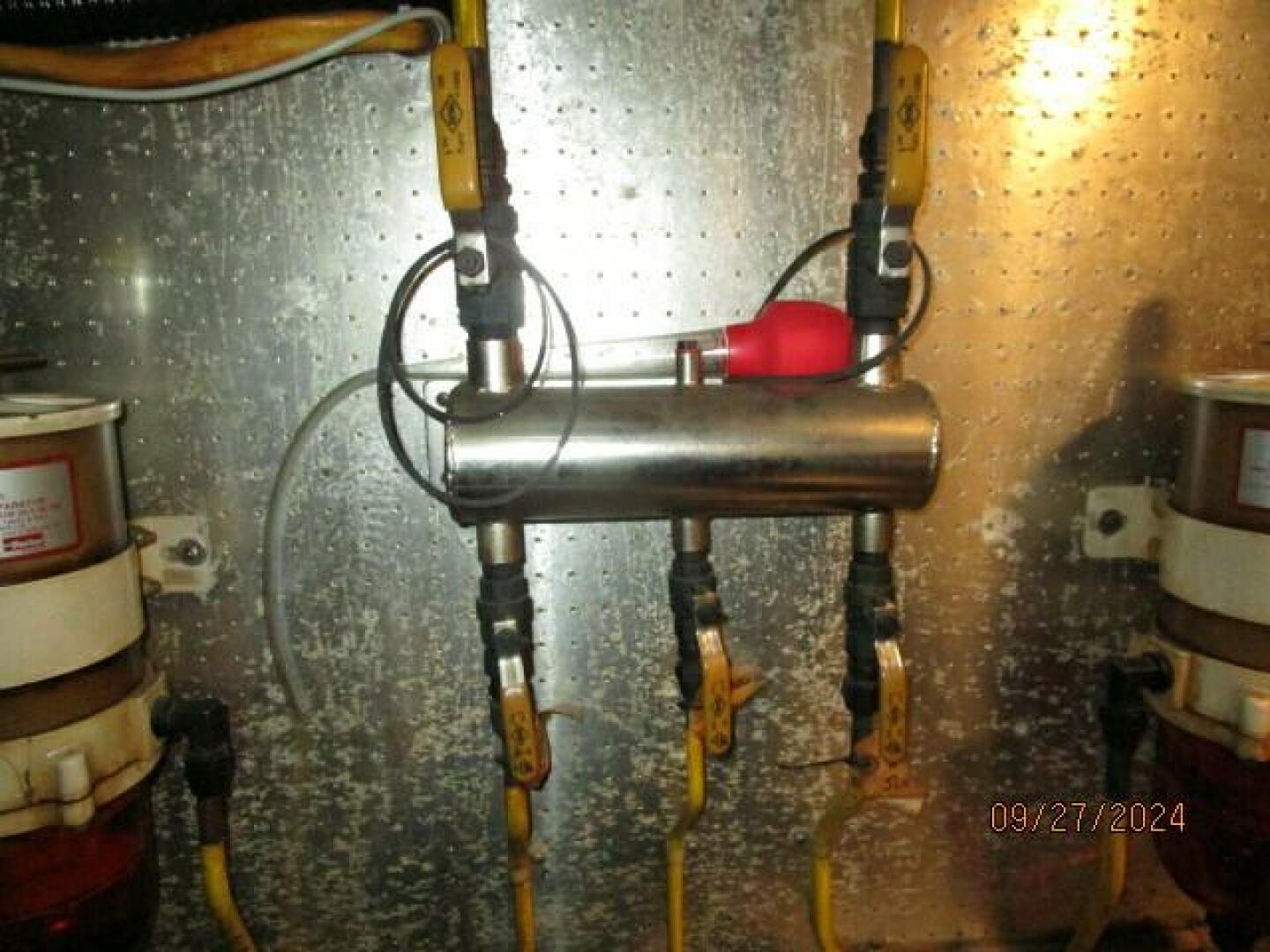 Slide: The Image of 46' Marine Trader fuel manifold - 63