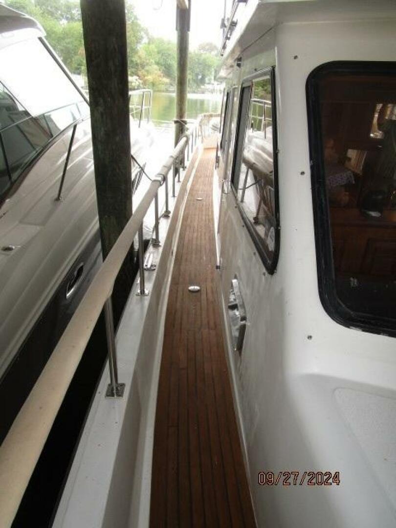 Slide: The Image of 46' Marine Trader starboard side deck1 - 7