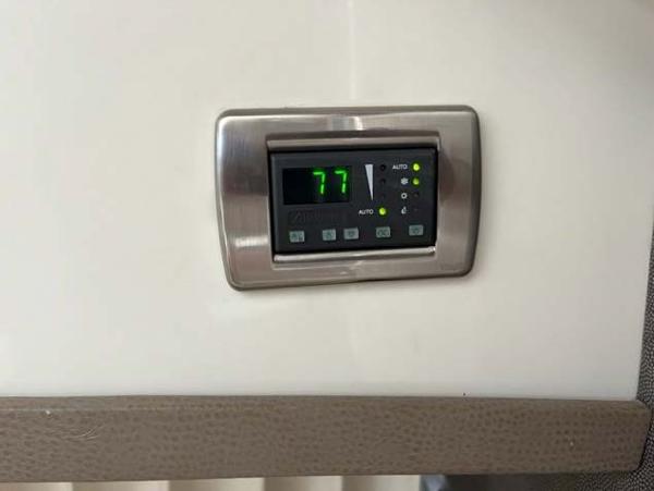 Slide: The Image of Digital thermostat display in a 2008 Marquis 40 SC yacht. - 43