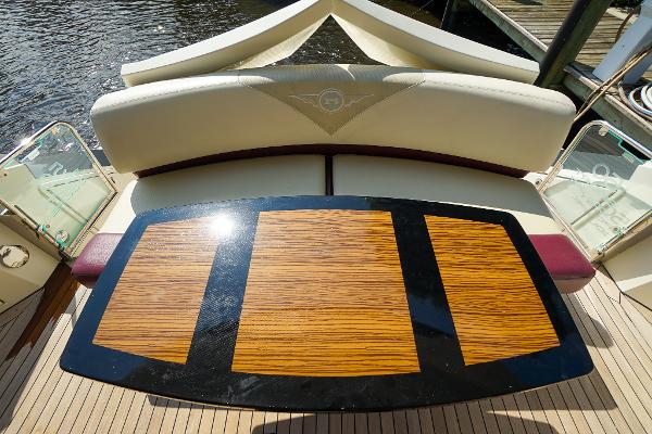 Slide: The Image of Luxury seating area on a 2009 Marquis 500 Sport Coupe yacht. - 15