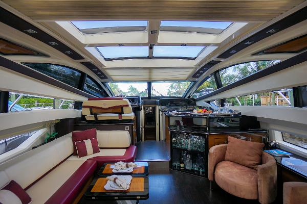 Slide: The Image of Luxurious interior of a 2009 Marquis 500 Sport Coupe yacht with modern furnishings. - 24