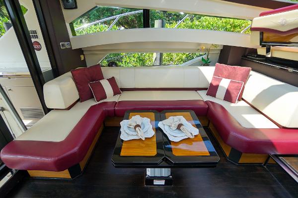 Slide: The Image of Luxurious interior of a 2009 Marquis 500 Sport Coupe yacht with plush seating and elegant decor. - 27